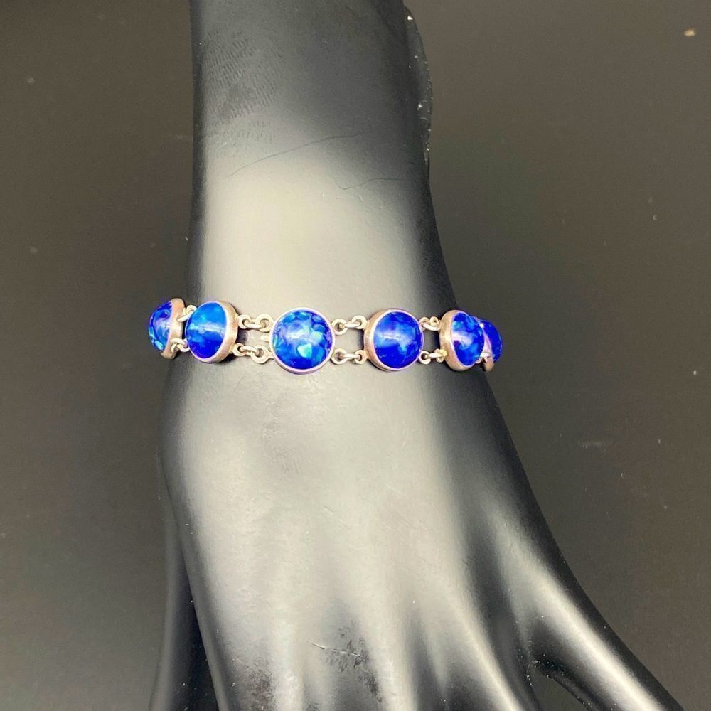 6” sterling bracelet with Lapis Lazuli stones that are approx 3/8” in diameter